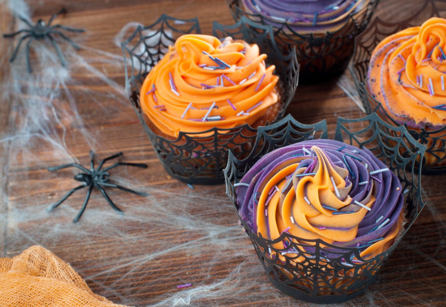 Halloween cupckes with purple and orange icing for an educational Halloween