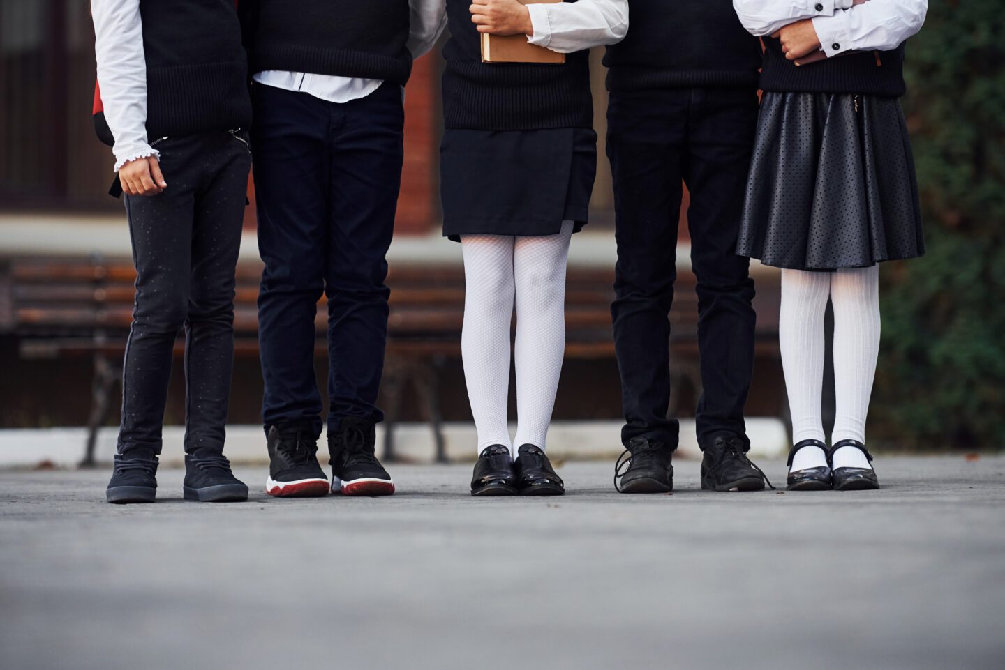 Close up view of kids in school uniform for their school entrance exam.