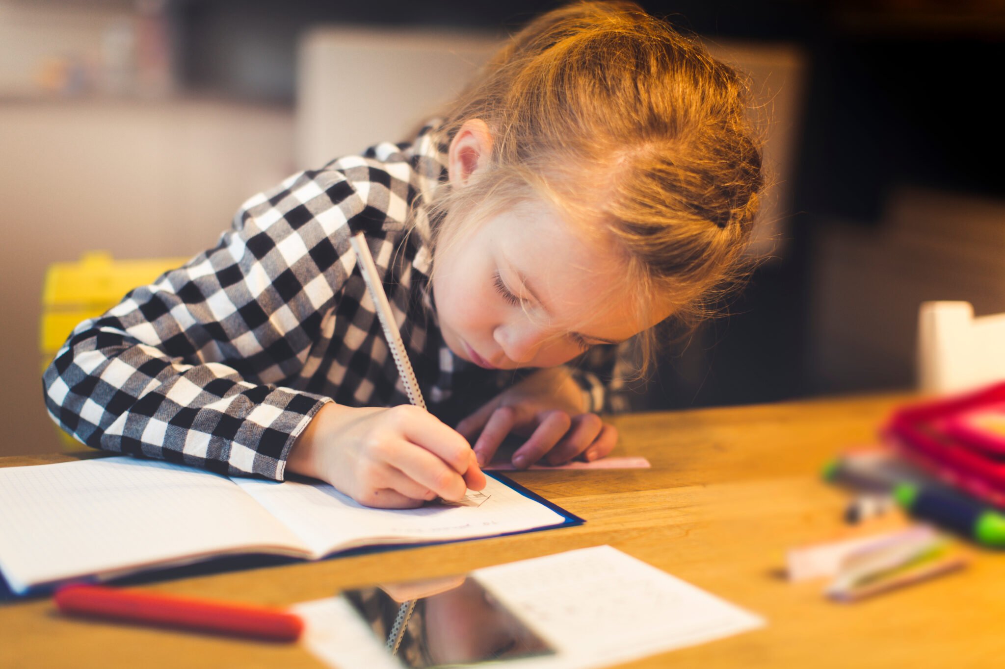 young girl sitting her 7 plus exam 